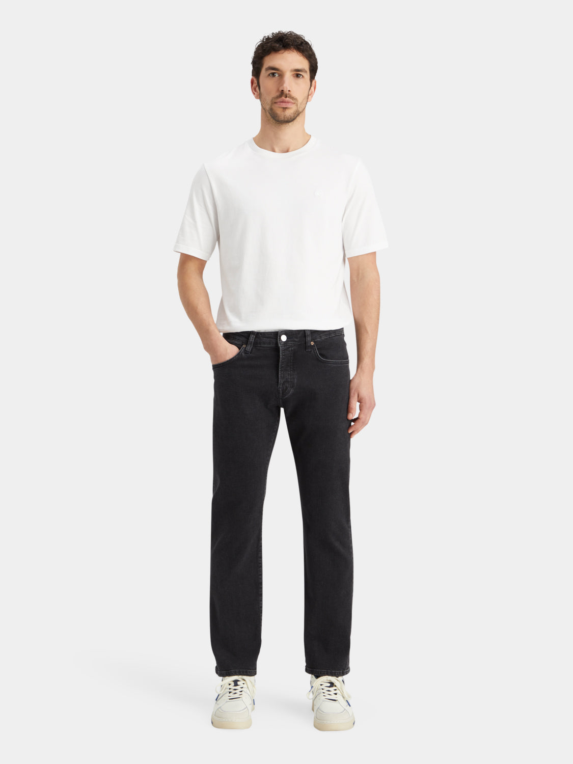 Light blue Scotch & SODA Zee straight-fit denim jeans displayed on a model, showcasing classic five-pocket design and slim fit.