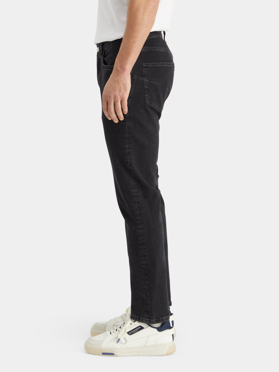 SCOTCH & SODA Zee straight-fit denim jeans shown on a model, featuring classic five-pocket design and medium wash fabric.