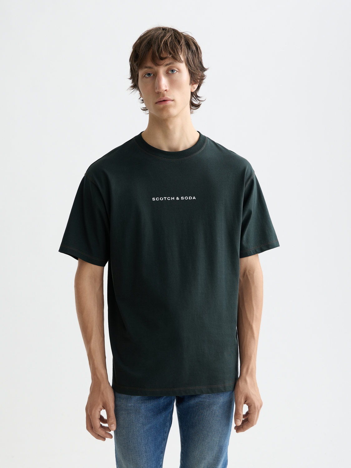 Short sleeve logo t-shirt by Scotch & Soda featuring a front graphic design on soft cotton fabric.