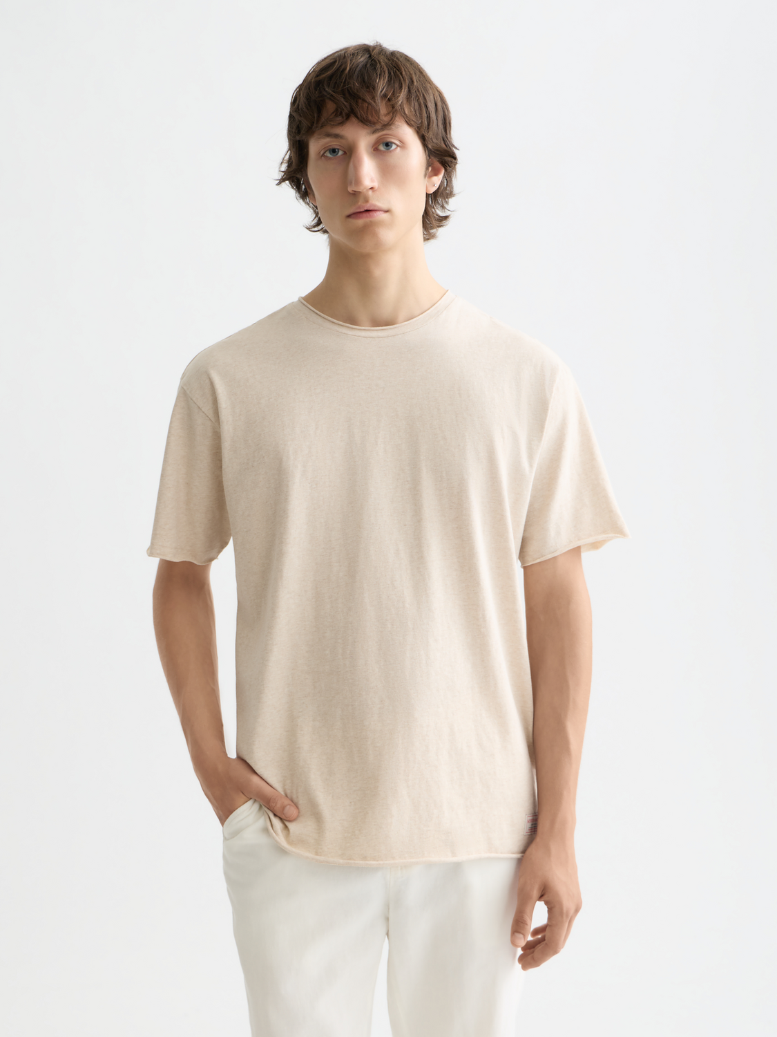 Raw-edged Scotch & SODA short-sleeve tee with a casual fit, shown in a front view with a relaxed, stylish design.