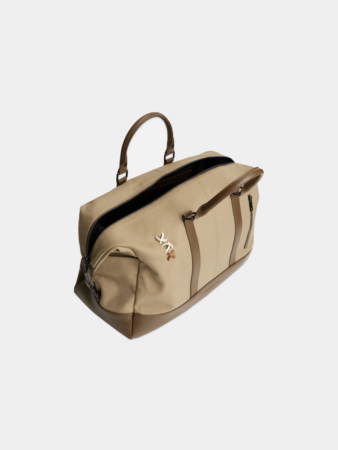 Canvas weekender bag from Scotch & Soda featuring durable fabric, spacious interior, and adjustable shoulder strap.