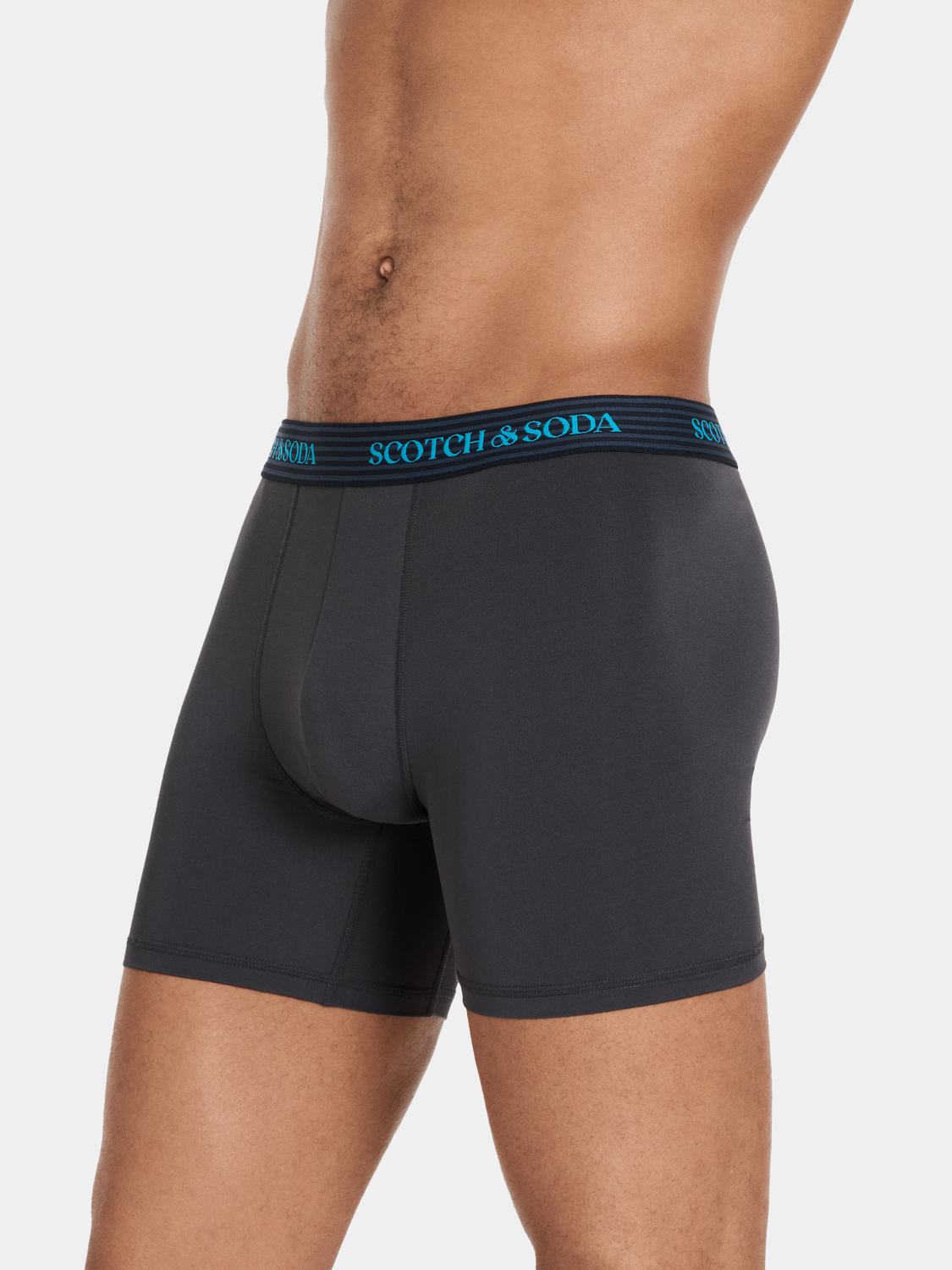 Three-pack boxer briefs by Scotch & Soda, featuring comfortable underwear with elastic waistbands and various colors.