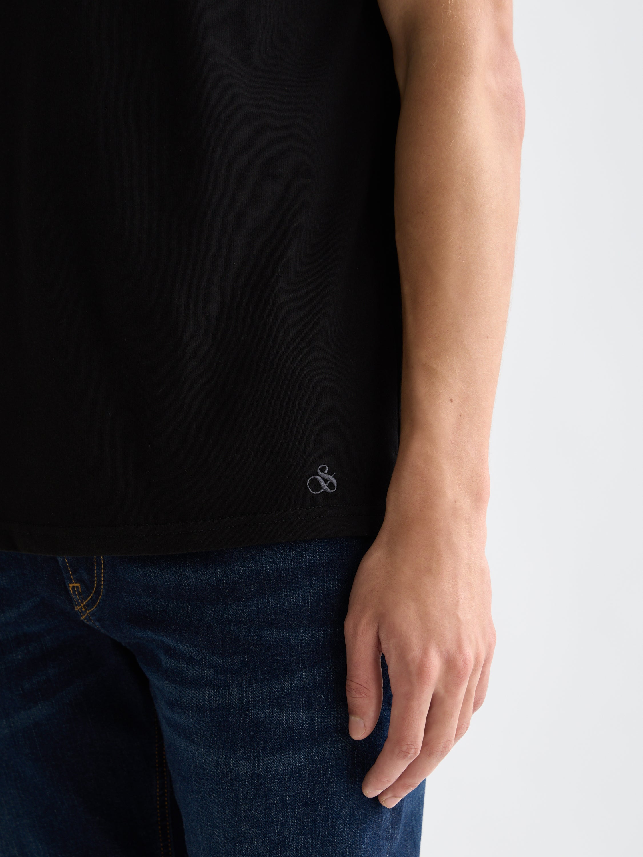 Three Scotch & Soda men's short sleeve v-neck t-shirts in neutral colors, laid flat on a white background.