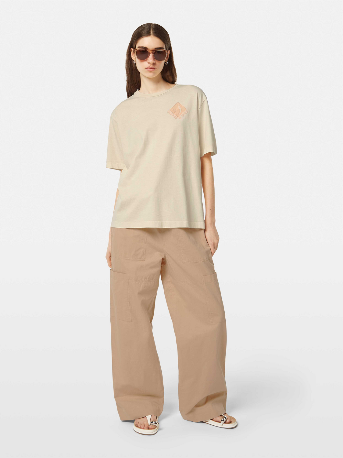 Light blue Scotch & Soda short-sleeve garment-dyed t-shirt with a crew neck and subtle branding visible on the front.