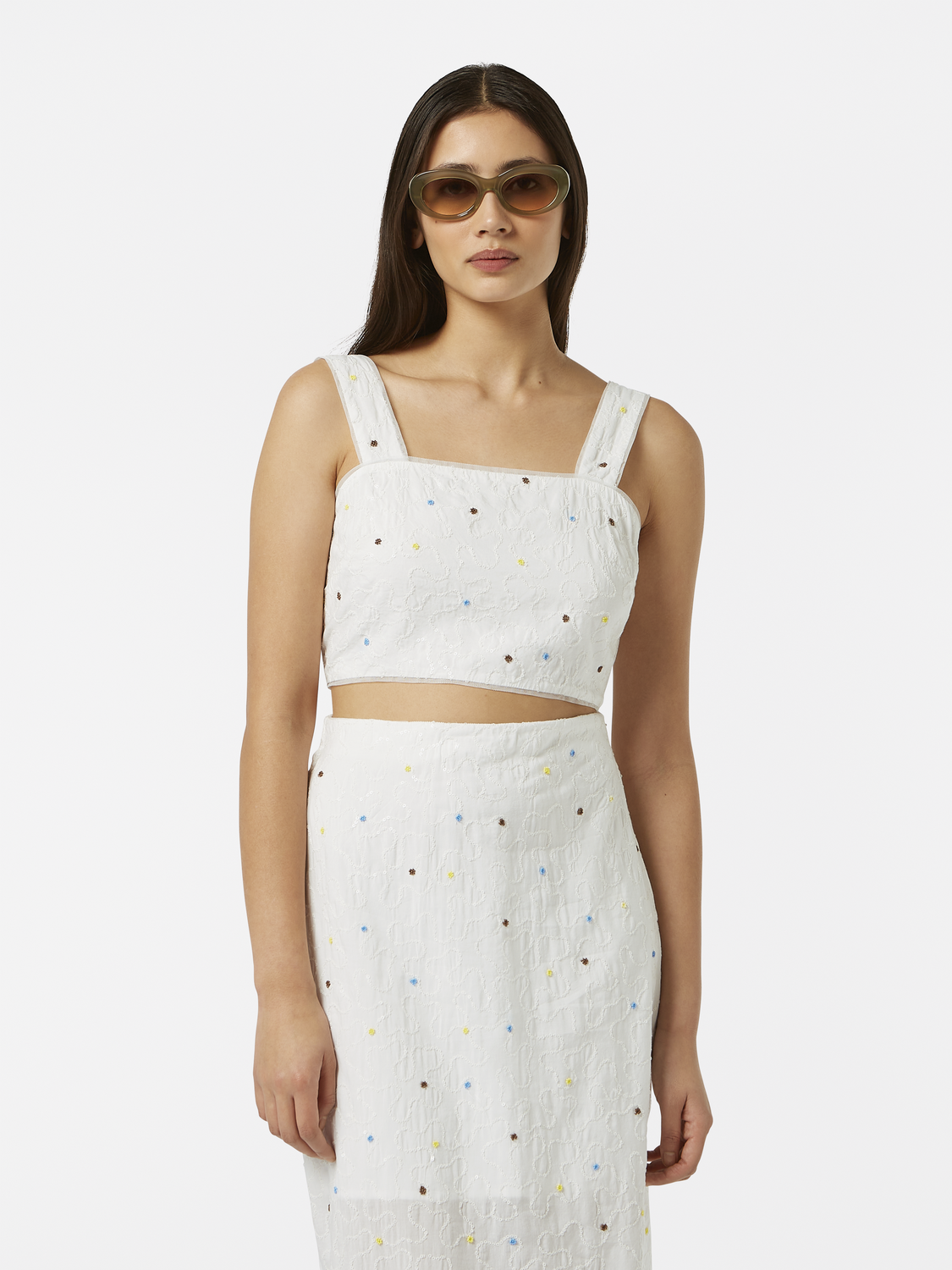 Beaded crop top tank by Scotch & Soda, featuring colorful bead embellishments and a stylish sleeveless design.