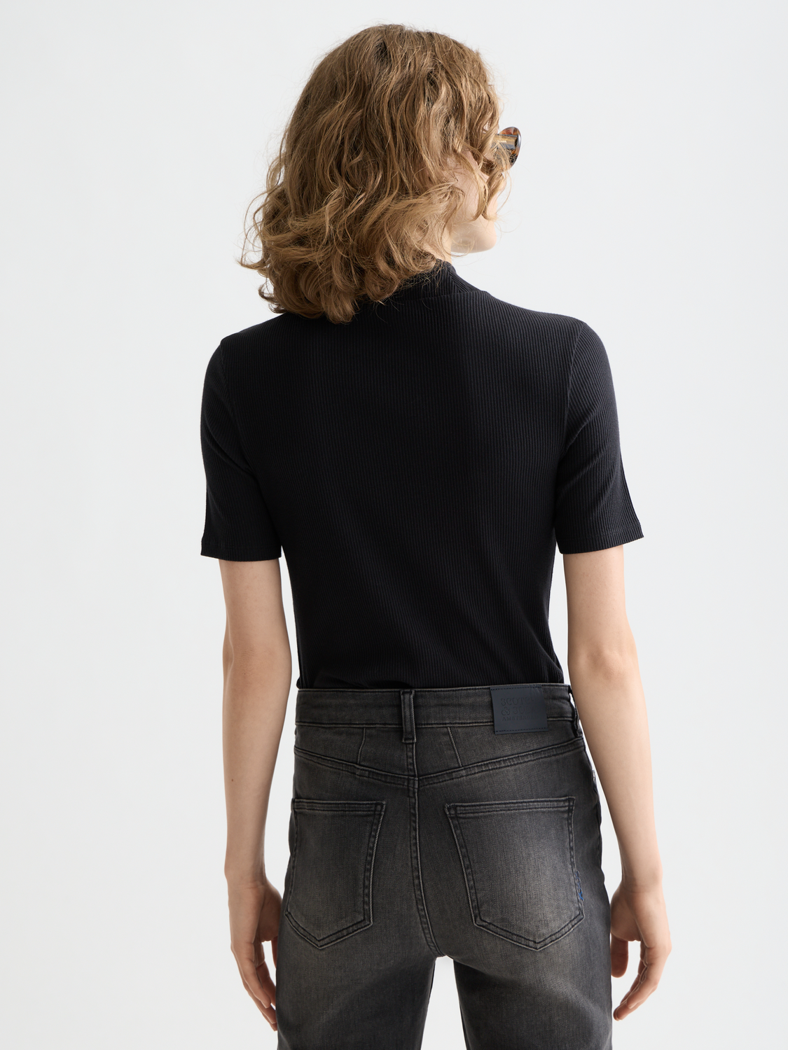 Light blue ribbed mock neck short sleeve tee by Scotch & Soda, showing the back view with textured fabric and fitted silhouette.