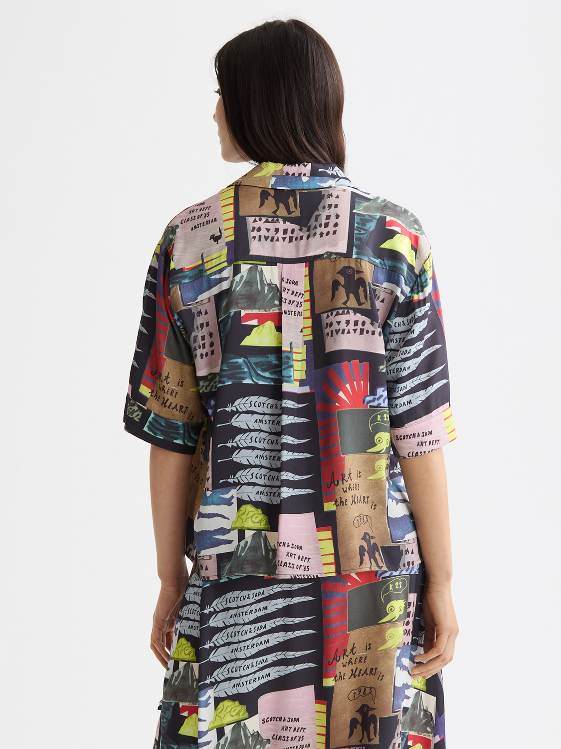 Printed Scotch & Soda short-sleeved shirt with a stylish pattern, displayed from the back in the product image.