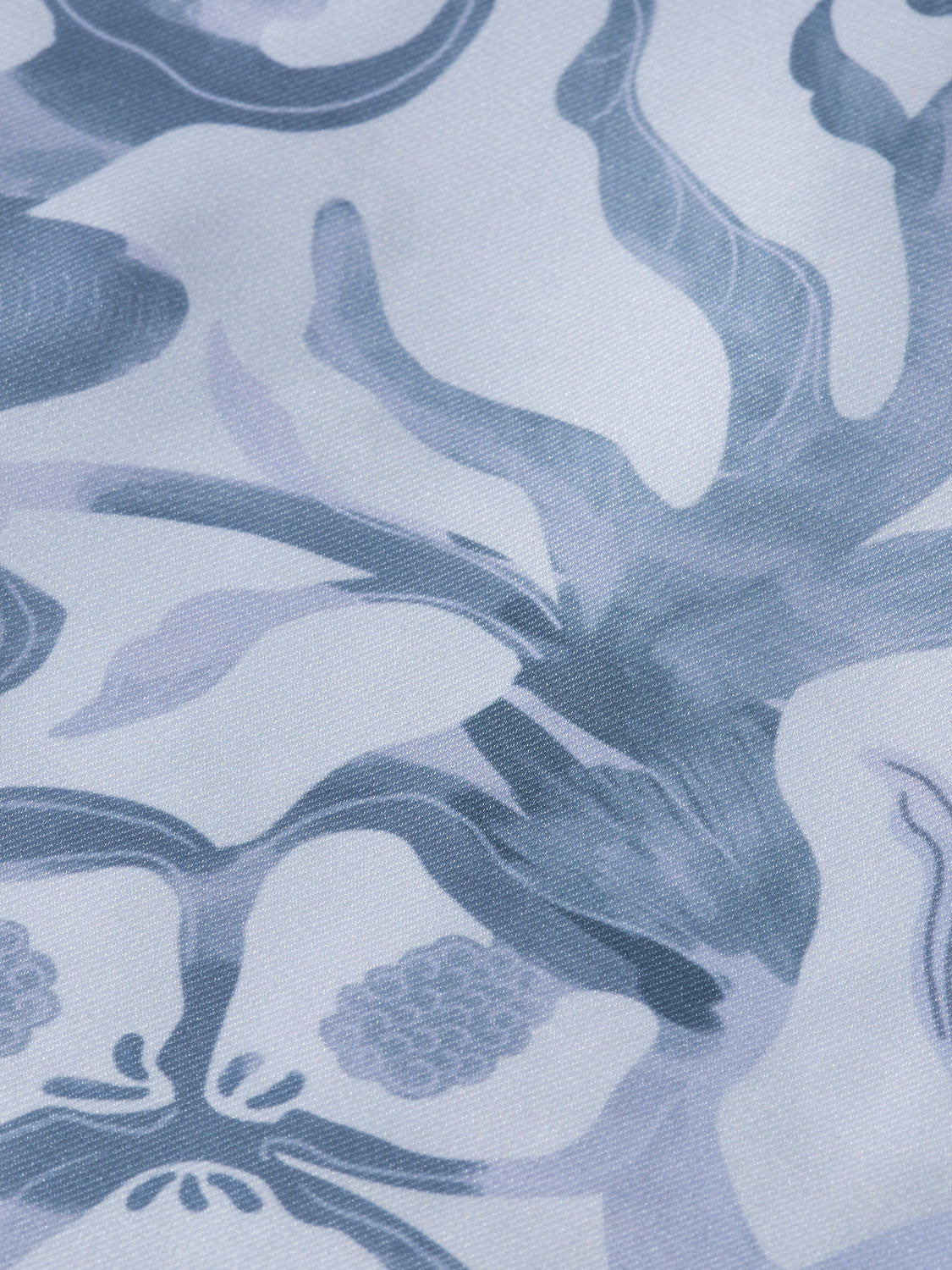 Printed short-sleeved shirt by Scotch & Soda featuring vibrant pattern and casual fit, displayed on a neutral background.