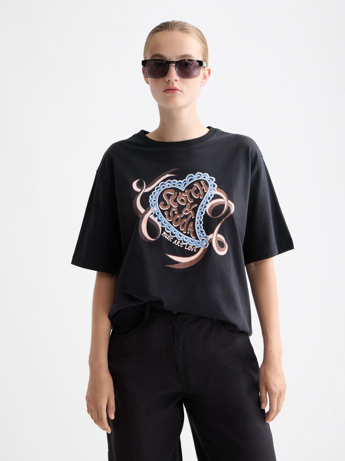 Short-sleeve Scotch & Soda artwork t-shirt featuring a colorful graphic print on soft fabric.