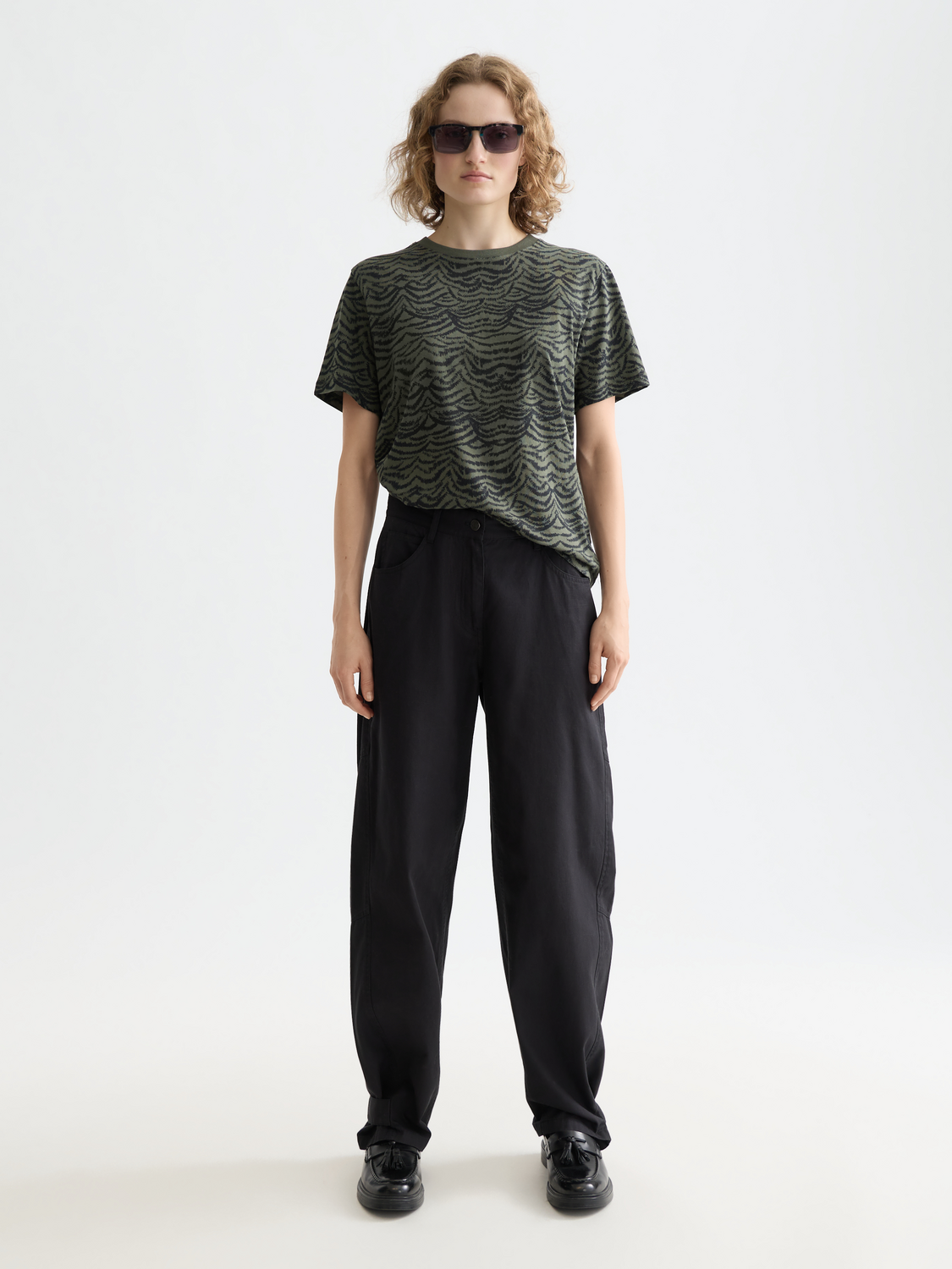 Printed SCOTCH & SODA short-sleeve t-shirt featuring a colorful graphic design on the front.