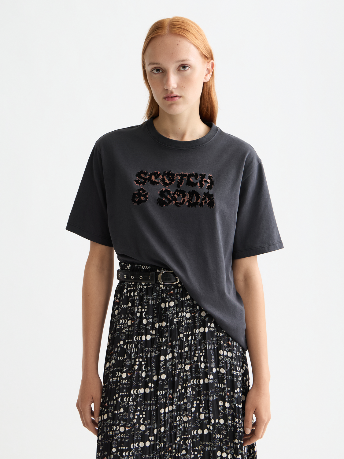 Scotch & Soda short-sleeve artwork T-shirt featuring a colorful graphic print on a casual cotton tee.