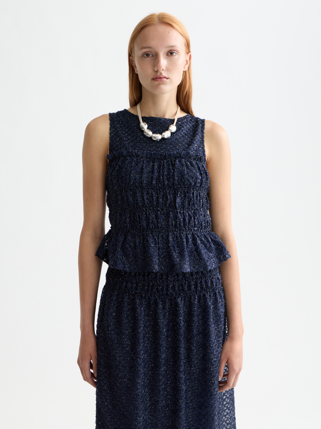 Smocked tank top from Scotch & Soda featuring a fitted design with ruffle details and adjustable straps.