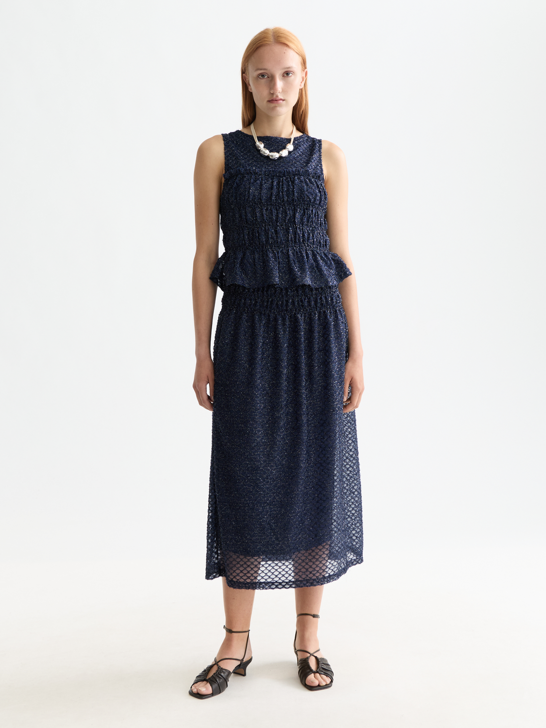 Yellow smocked tank top by Scotch & Soda with adjustable straps and ruffled detailing.