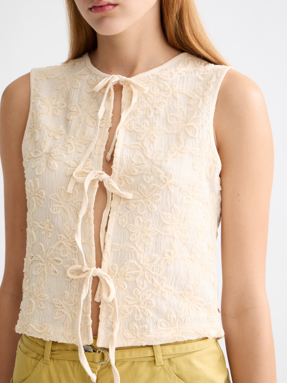 Structured tank top with bow closure by Scotch & Soda, featuring a fitted design and sleeveless style.