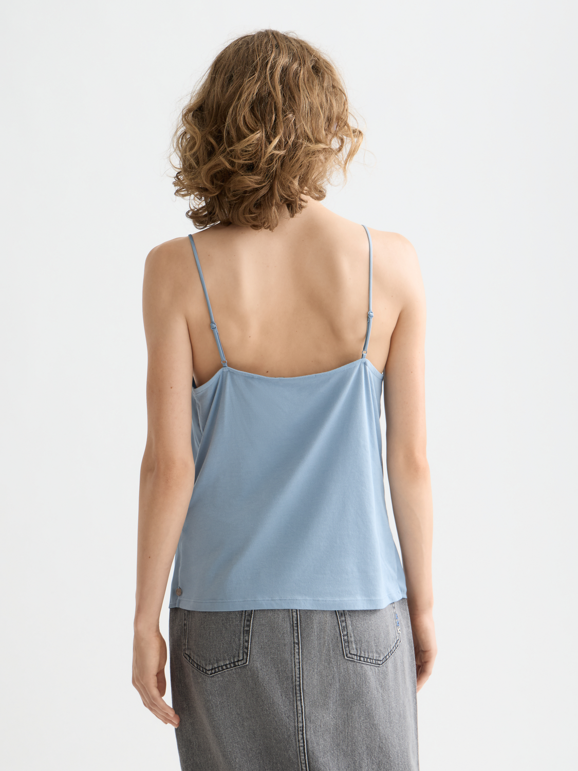 Black Scotch & Soda woven jersey tank top with sleeveless design and relaxed fit, displayed on a plain background.