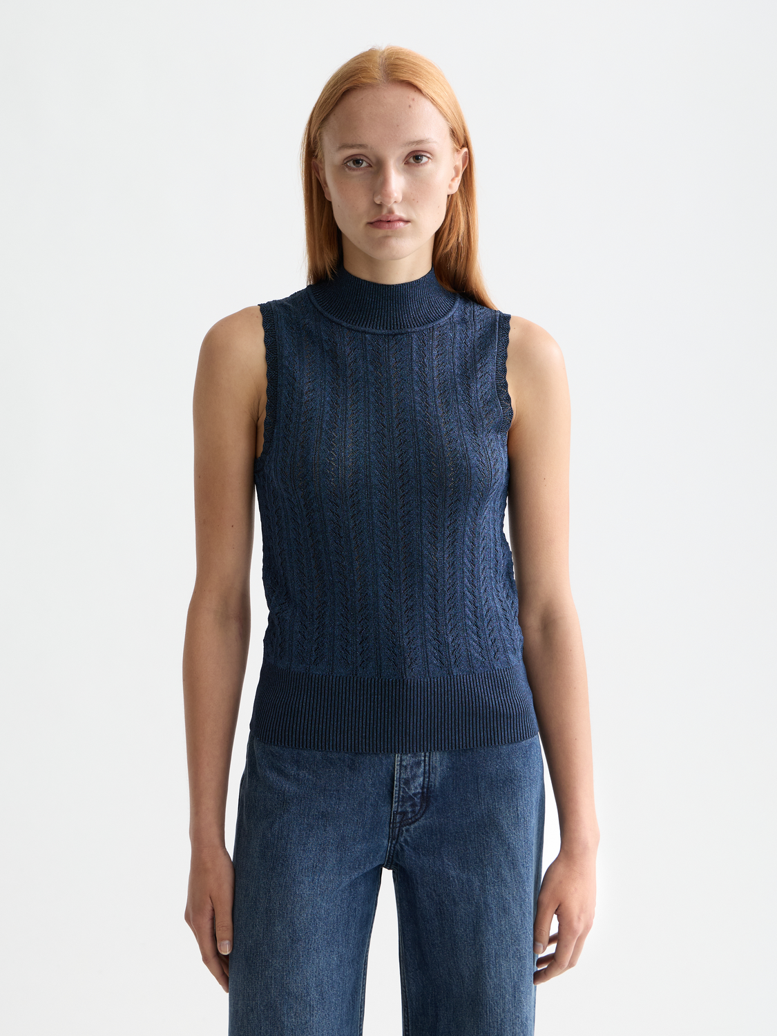 Metallic pointelle tank top from Scotch & Soda, featuring a sleeveless design with a shiny, textured fabric.