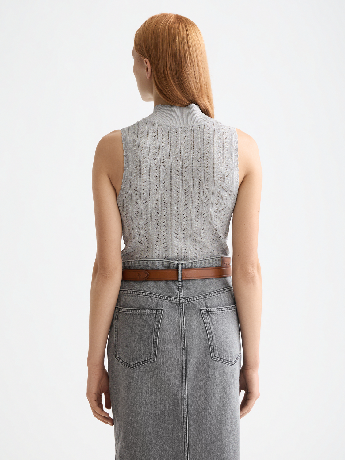 Metallic pointelle tank top by Scotch & Soda, featuring a lightweight, textured fabric with a sleeveless design and subtle shimmer.