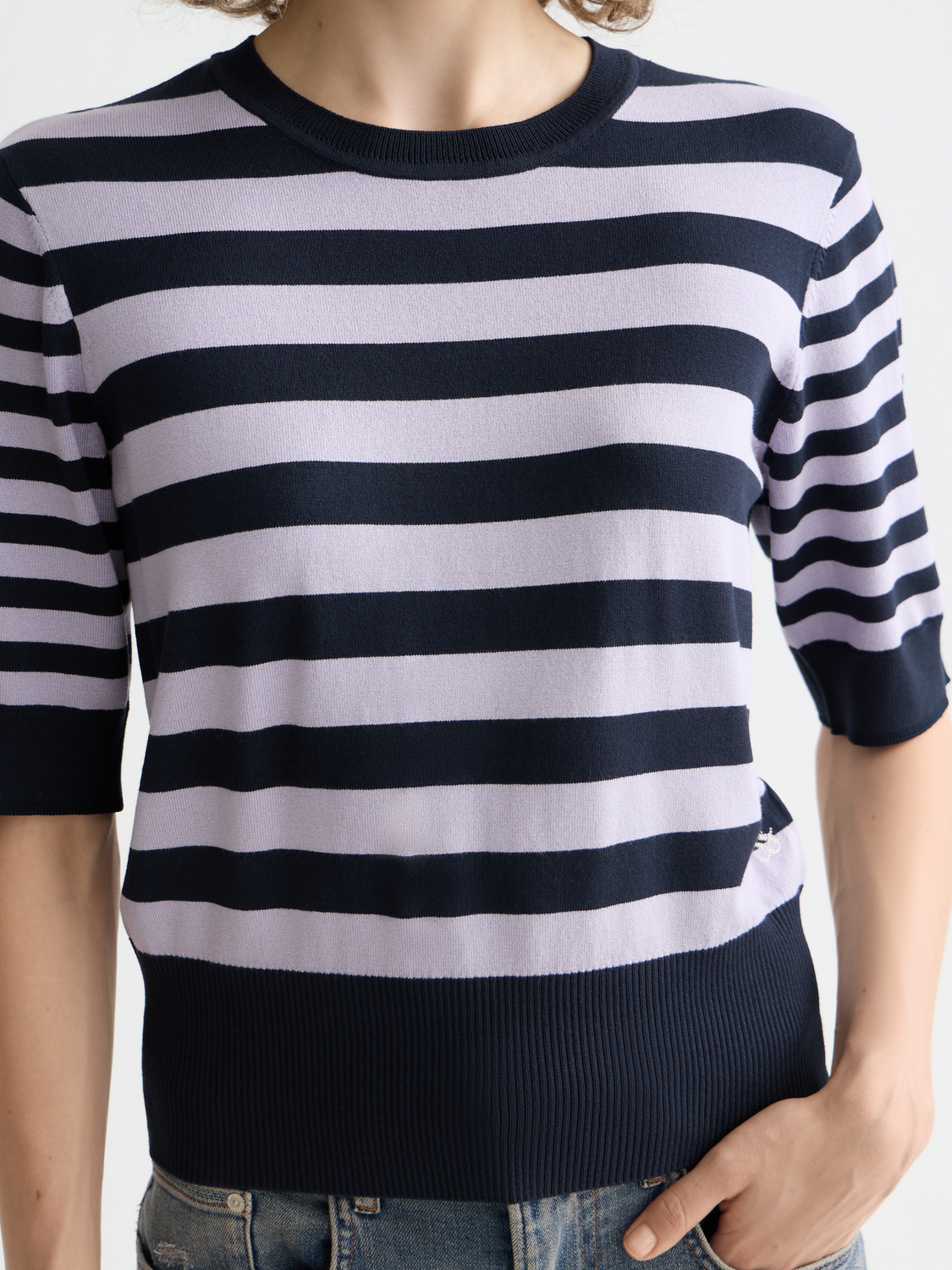 Light blue knit short-sleeved pullover top from Scotch & Soda, featuring a relaxed fit and ribbed neckline.