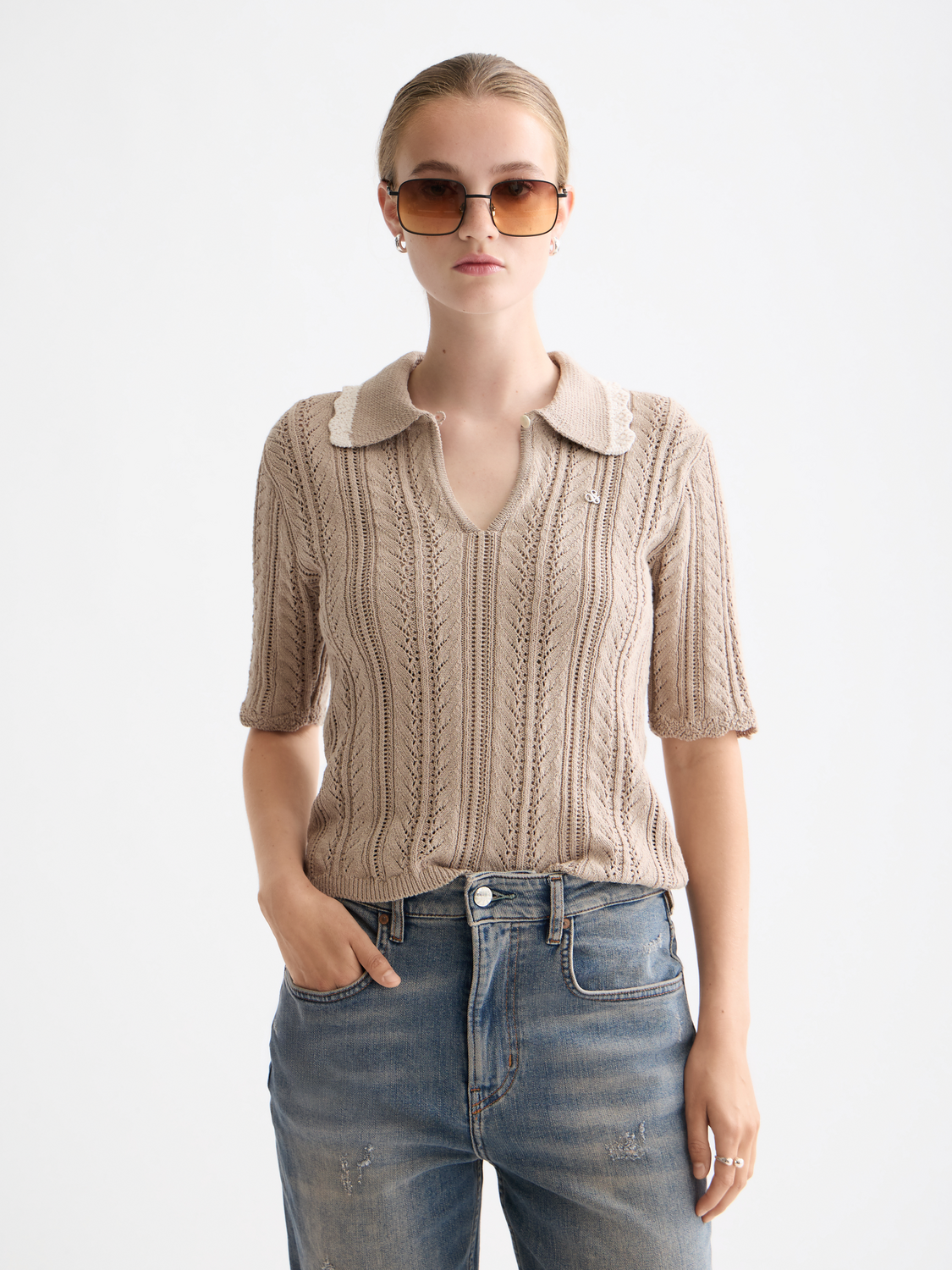 Pointelle knit collared polo shirt by Scotch & Soda, featuring a textured pattern and classic collar design.