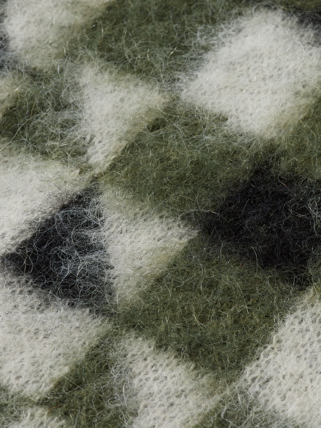 Fuzzy jacquard Scotch & Soda knitwear spencer with textured pattern and soft fabric, displayed on a plain background.