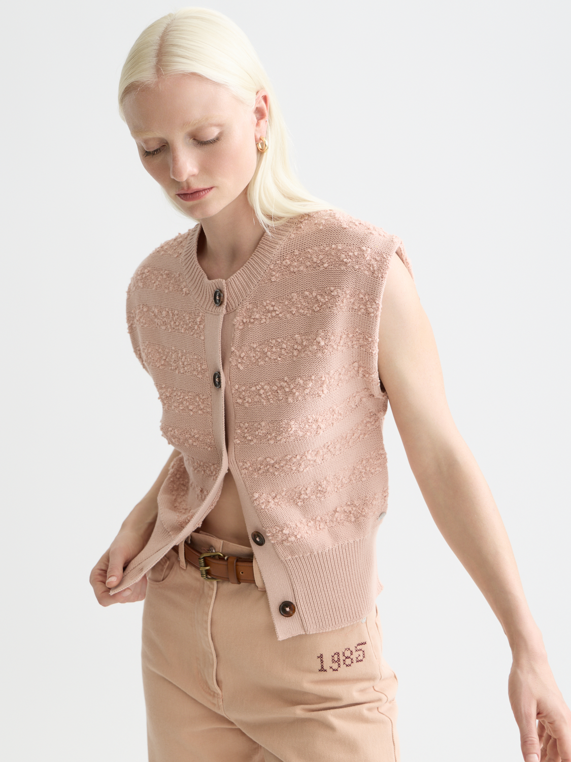 Scotch & Soda boucle stripe spencer knitwear with multicolored striped pattern and textured boucle fabric.