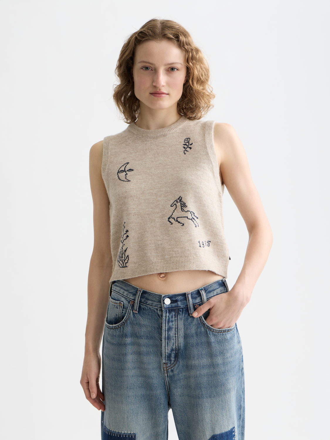 Scotch & Soda knitted tank top in soft knitwear, featuring a sleeveless design and textured pattern, front view.
