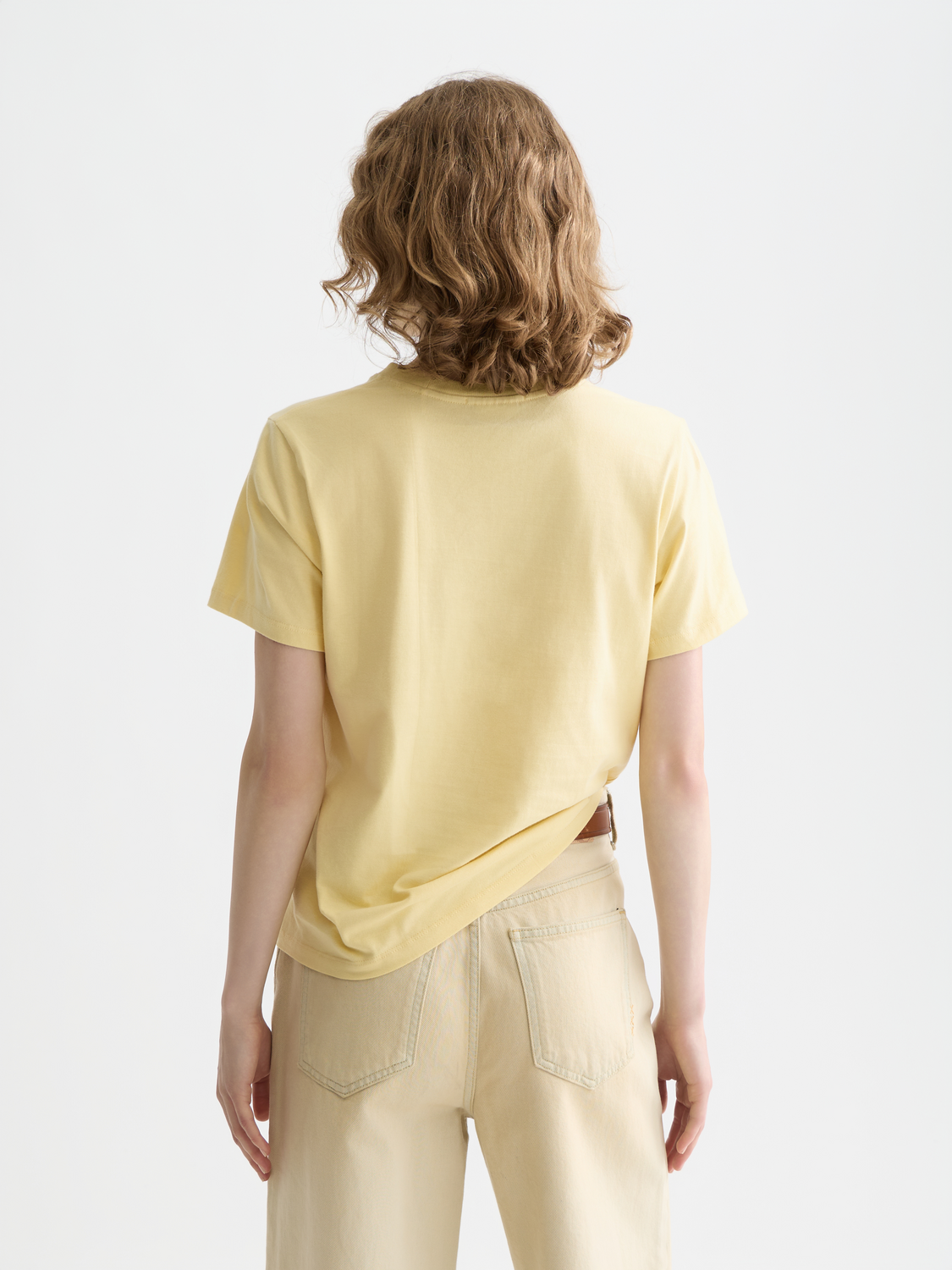 Black embroidered Scotch & Soda short sleeve T-shirt with colorful floral embroidery on the back, casual and stylish.
