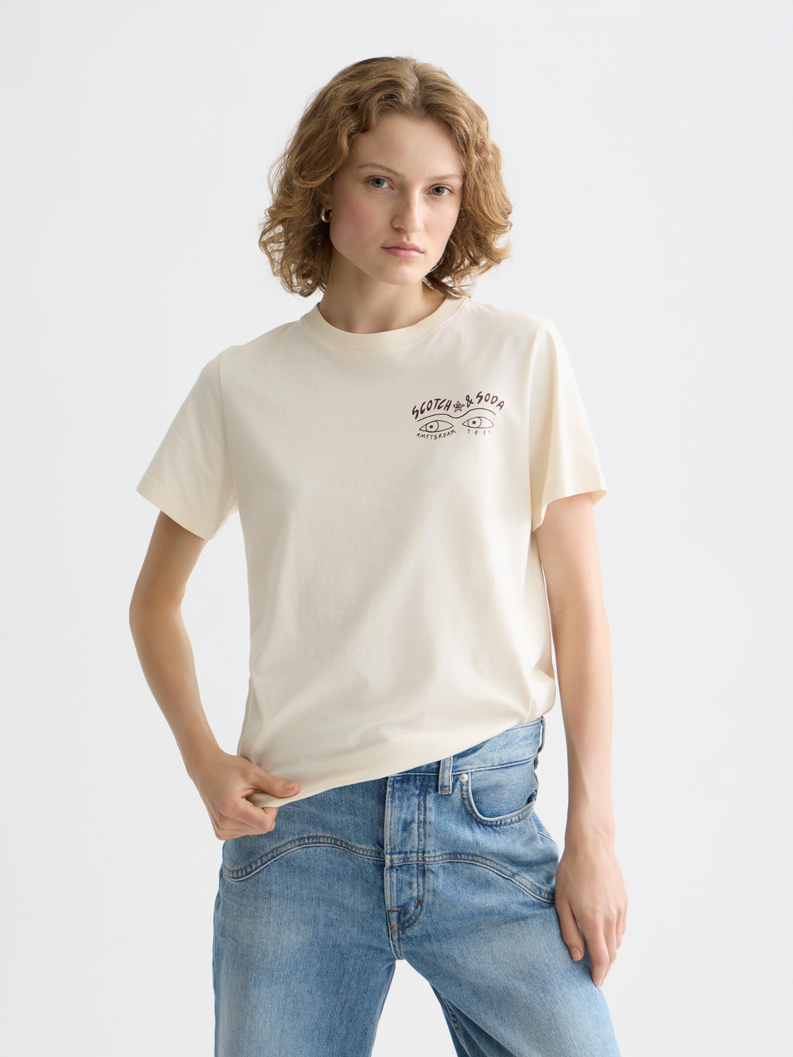 Short sleeve t-shirt by Scotch & Soda featuring chest artwork, casual fit, and soft fabric in a stylish, modern design.