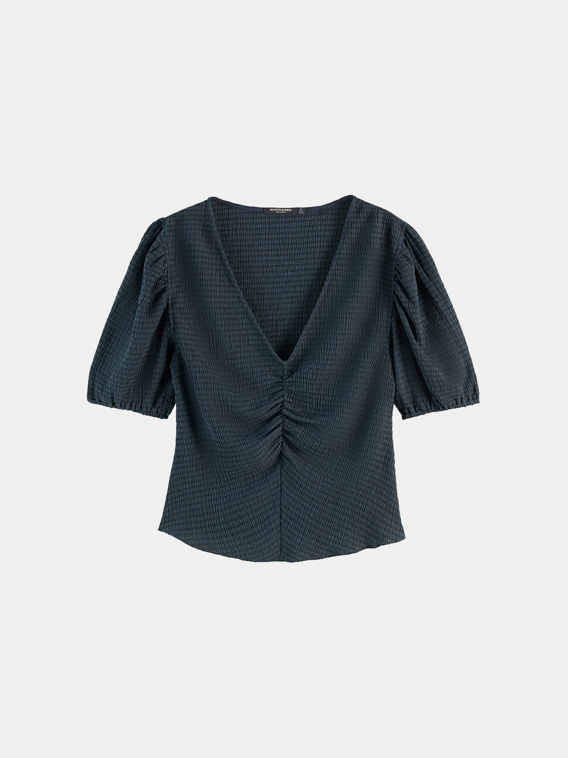 Structured v-neck top from Scotch & Soda, short sleeve tee with clean lines and a fitted silhouette, shown in a neutral fabric.