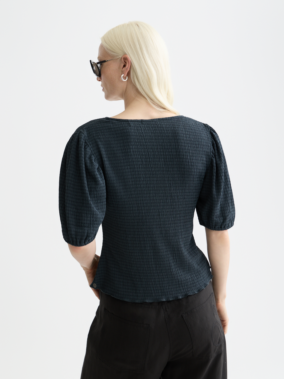 Structured v-neck Scotch & Soda short-sleeve tee in soft fabric, featuring a fitted silhouette and subtle back detail.