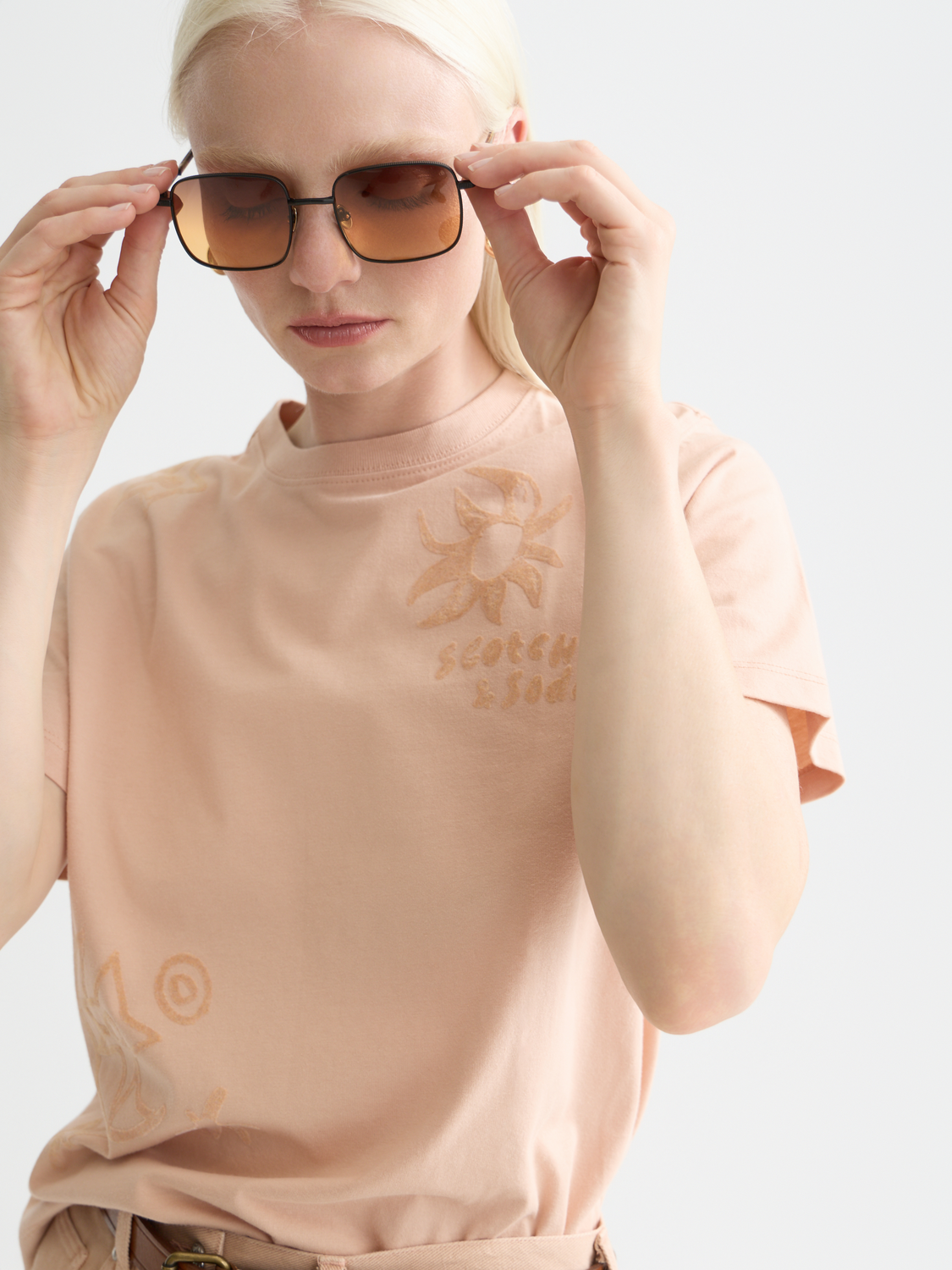 Scotch & Soda short sleeve flock print t-shirt featuring a colorful flock design on soft fabric.
