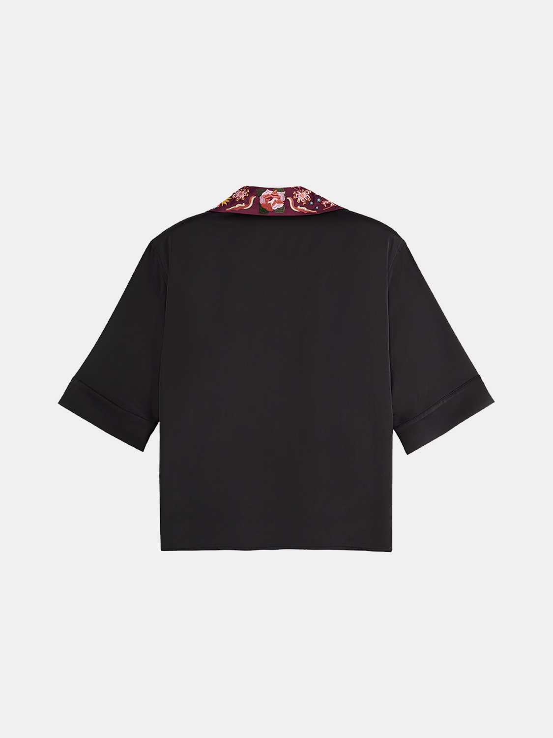 Black embroidered Scotch & Soda short sleeve shirt with detailed floral embroidery on the front and back.