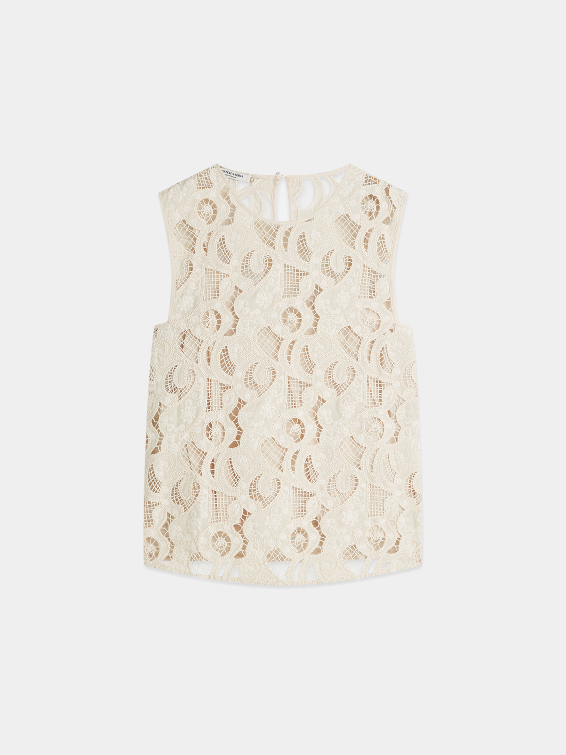 Embroidered woven top by Scotch & Soda featuring intricate embroidery and lightweight fabric, worn by a model.