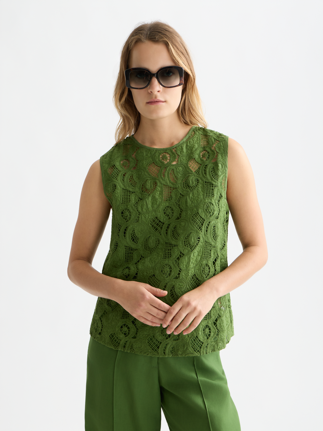 Embroidered woven top by Scotch & Soda featuring intricate floral embroidery and a relaxed fit on a model.