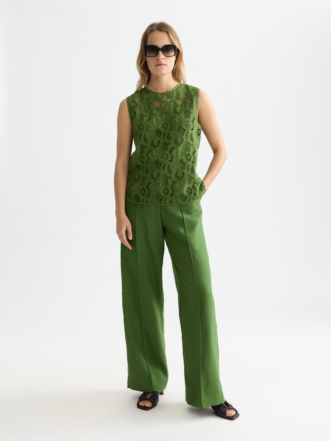 Embroidered woven top from Scotch & Soda featuring intricate embroidery and a relaxed fit, displayed on a mannequin.