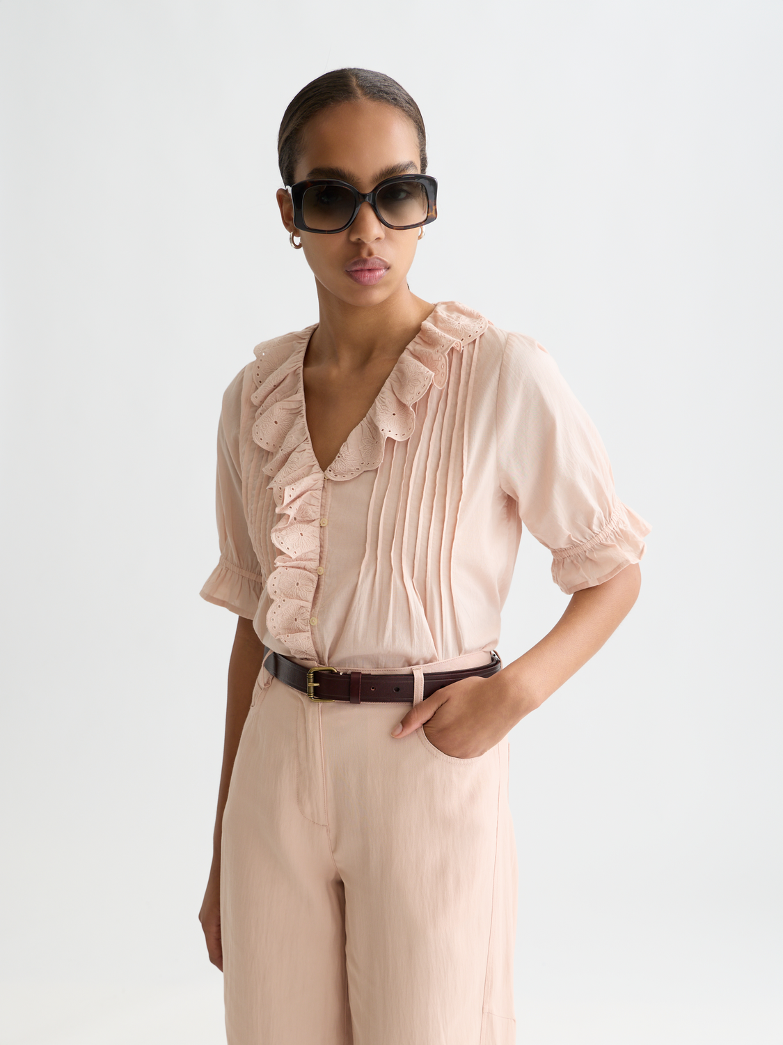 Embroidered short-sleeved woven blouse by Scotch & Soda featuring floral embroidery on lightweight fabric.