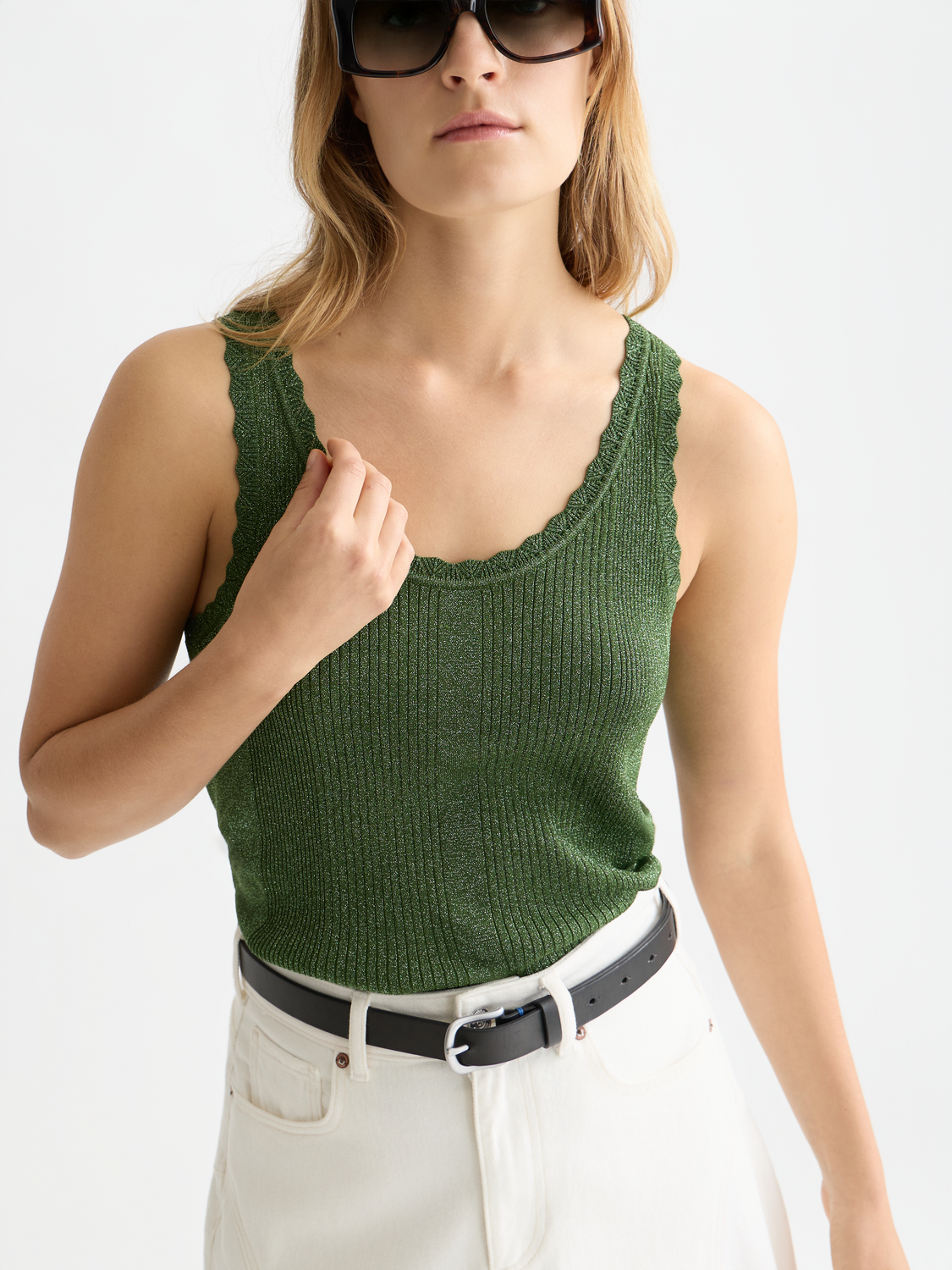 Metallic ribbed tank top from Scotch & Soda showing a close-up of the textured fabric and sleeveless design.