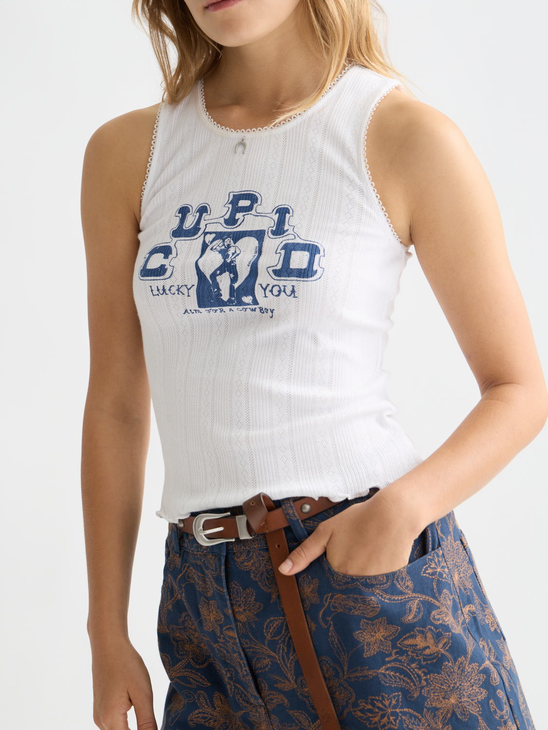 Pointelle artwork tank top by Scotch & Soda, featuring a delicate knit pattern and sleeveless design, shown in a neutral color.