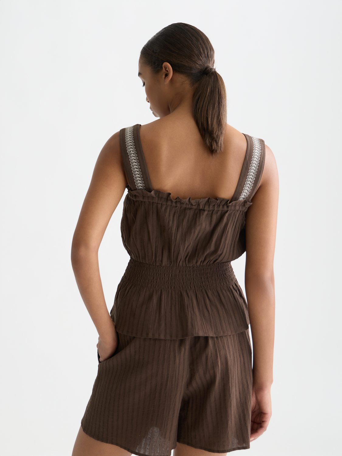 Scotch & Soda smocked waist tank top with adjustable straps, lightweight fabric, and a relaxed fit, shown from the back.