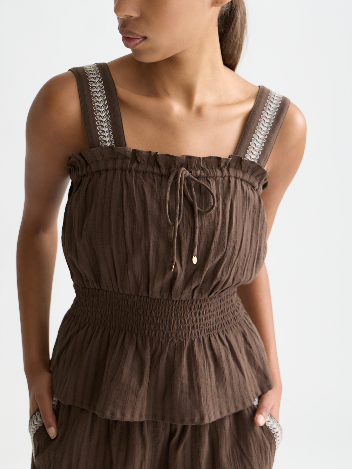 Smocked waist tank top by Scotch & Soda with sleeveless design and relaxed fit, perfect for casual summer outfits.