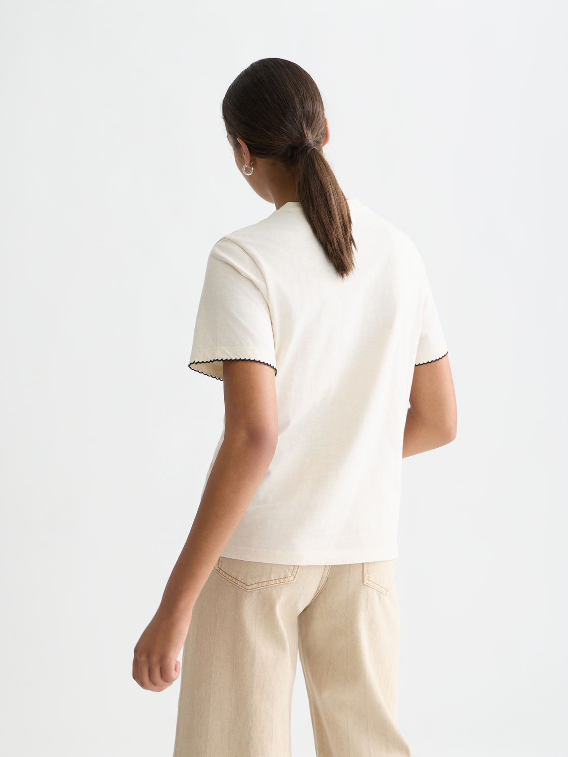 Blue embroidered Scotch & Soda short-sleeve slub t-shirt with subtle front embroidery and a casual fit, shown from the back.