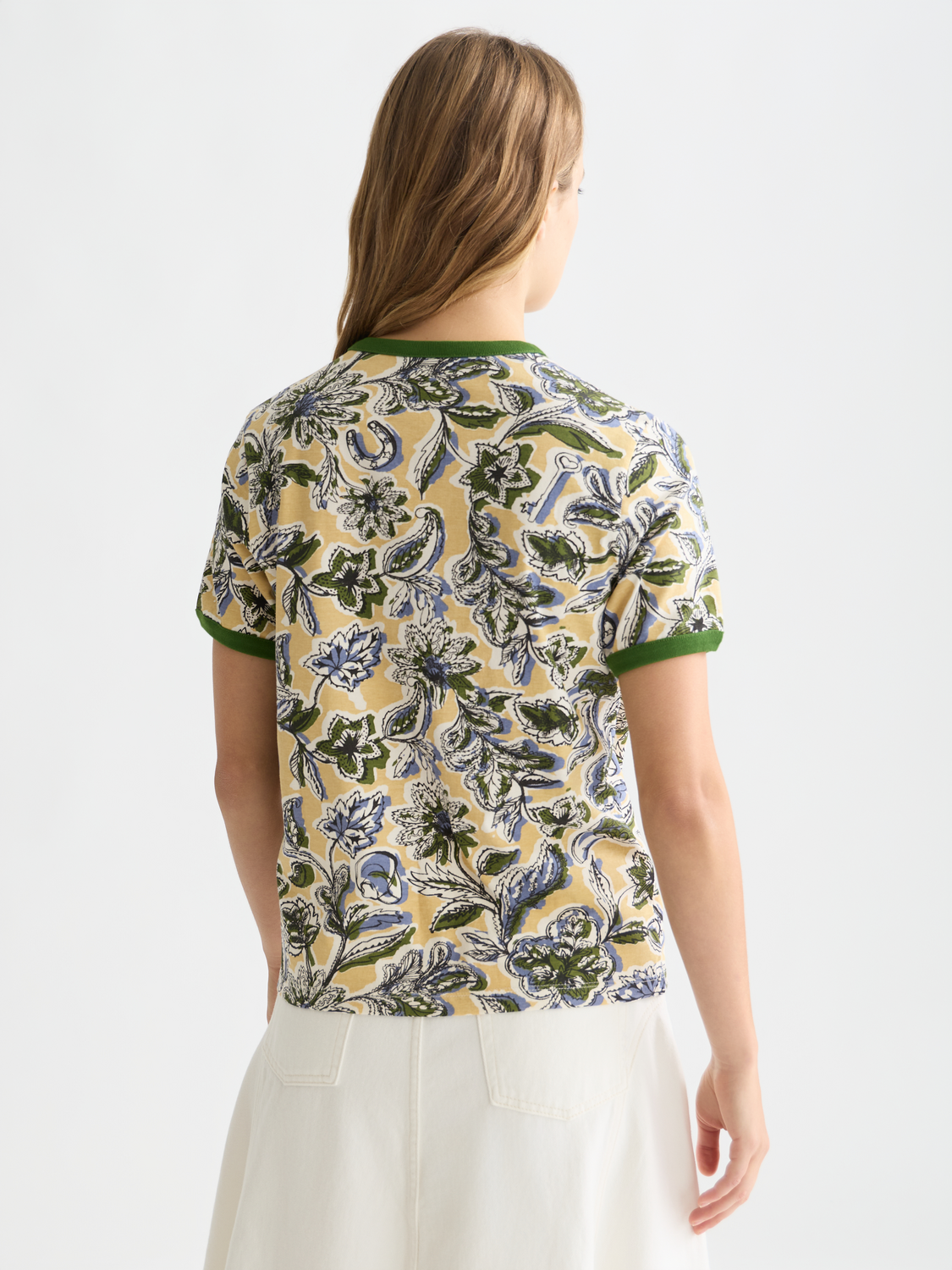 Printed Scotch & Soda short sleeve t-shirt with a graphic design on the back, displayed on a mannequin.