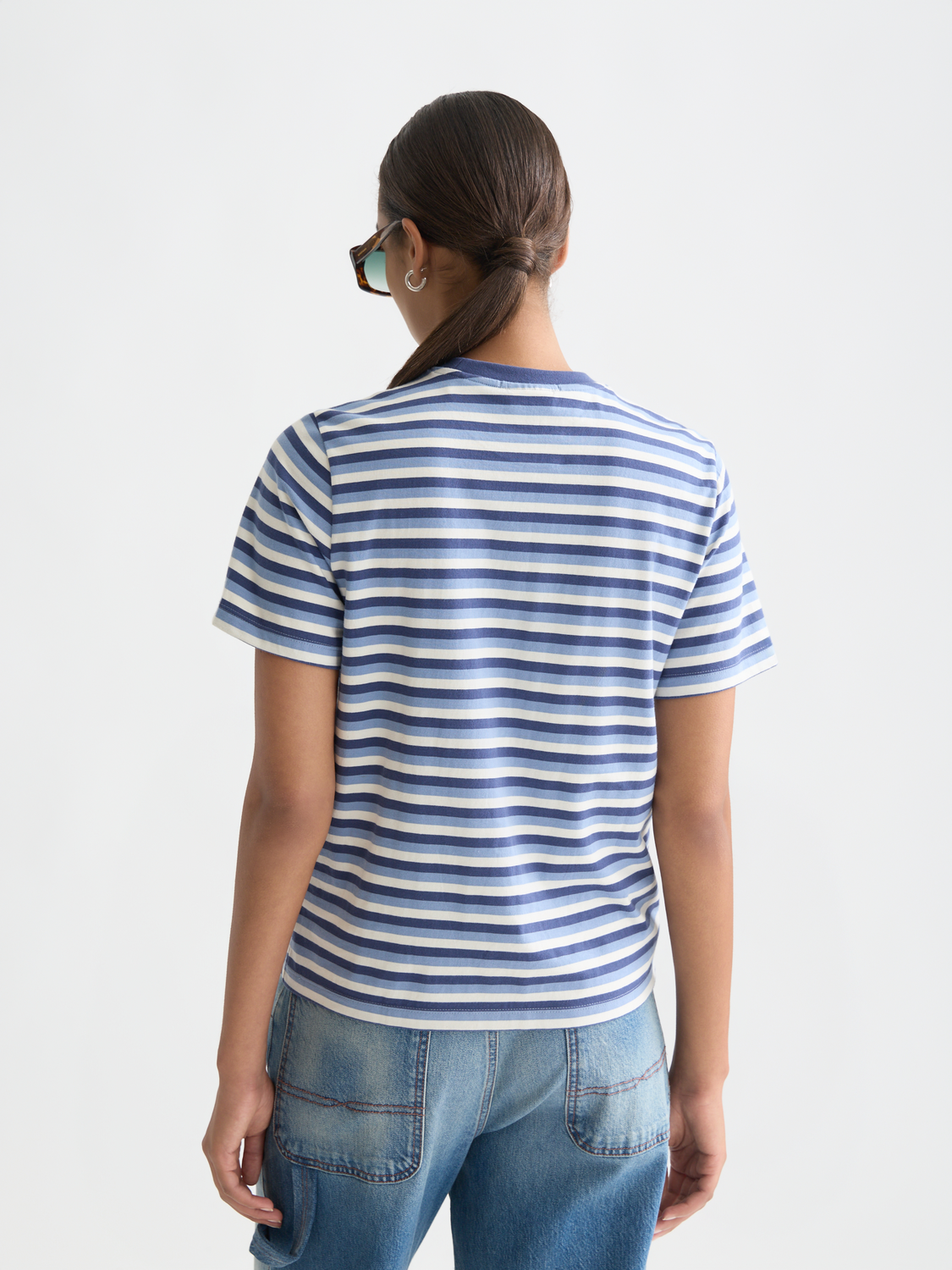 Striped Scotch & Soda short-sleeve t-shirt with blue and white horizontal stripes, back view showing fit and fabric details.