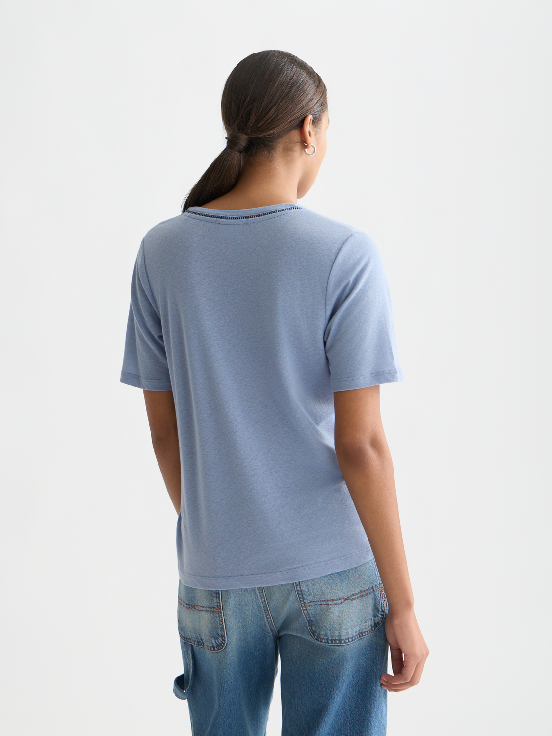 Linen V-neck T-shirt from Scotch & Soda, short sleeve tee with relaxed fit, shown from the back on a model.