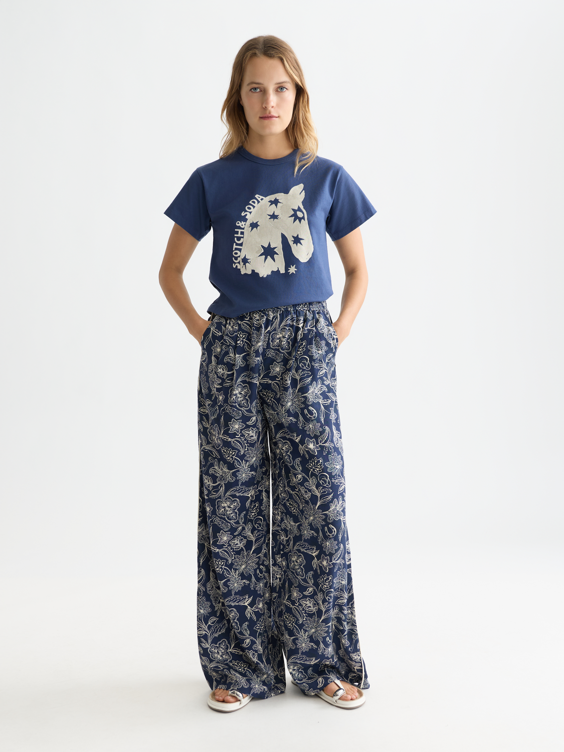 SCOTCH & SODA short sleeve artwork t-shirt featuring a vibrant graphic design on front.