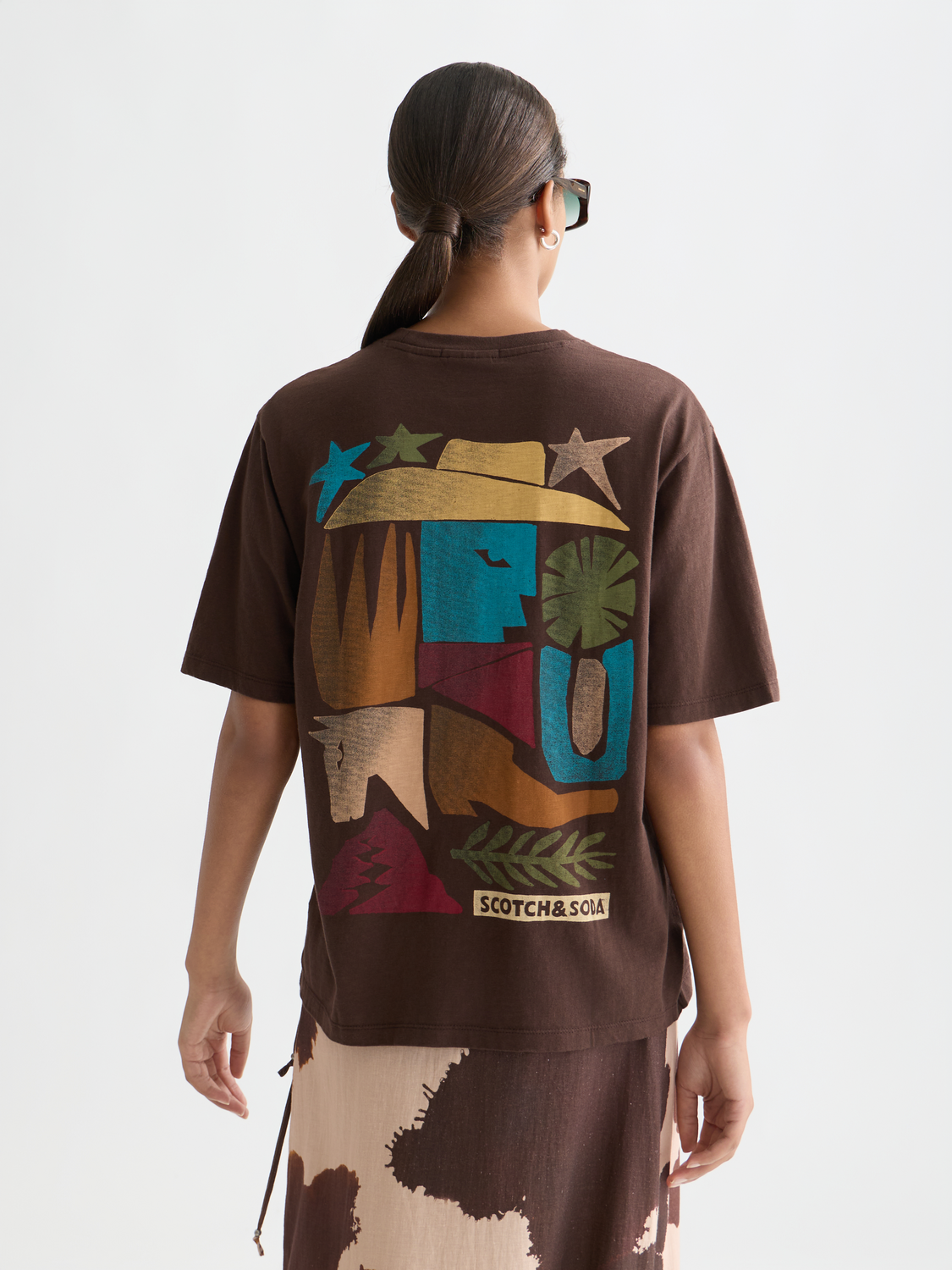 Scotch & Soda artwork short sleeve t-shirt with graphic design, casual crew neck and comfortable fit, front view.