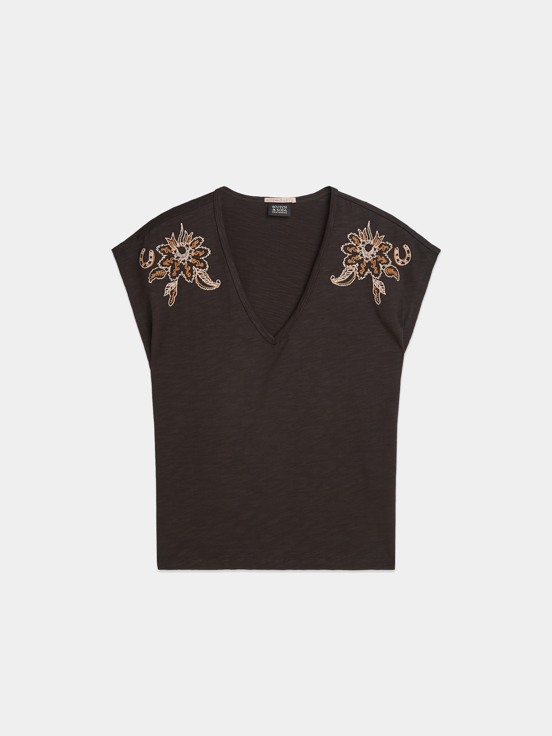 Embroidered V-neck Scotch & Soda short-sleeve T-shirt with colorful floral embroidery on a soft fabric background.