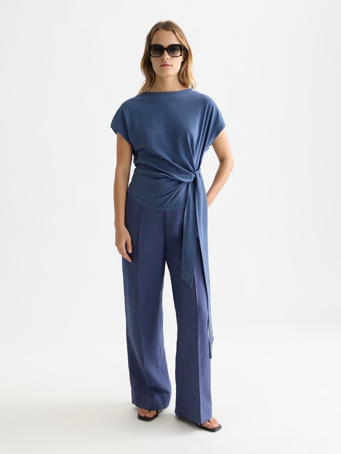 Blue knotted short-sleeve T-shirt by Scotch & Soda featuring a casual fit and stylish knot detail on the front.