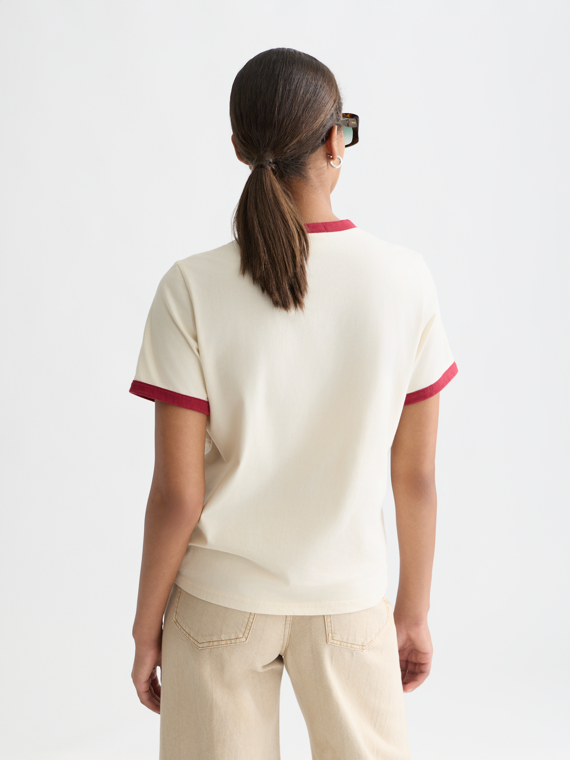 Black short-sleeve T-shirt with contrast binding by Scotch & Soda, shown from the back with a relaxed fit.