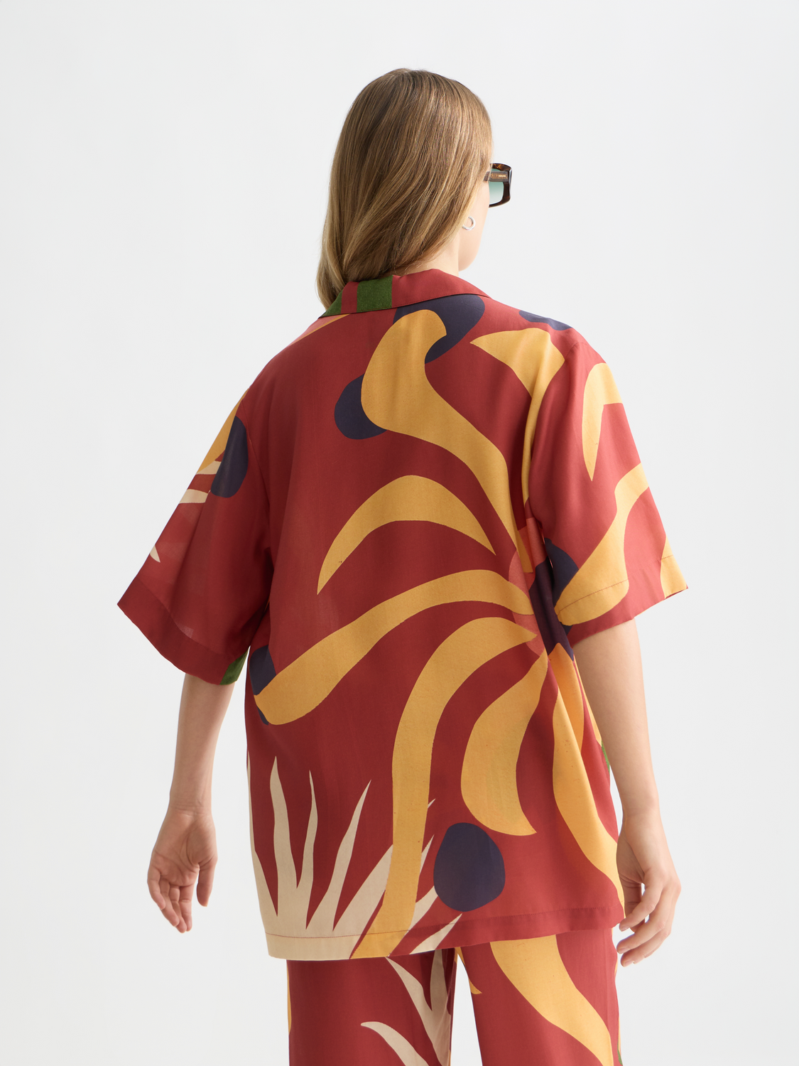 Printed short-sleeved shirt by Scotch & Soda, showcasing a vibrant pattern on the back and classic fit.